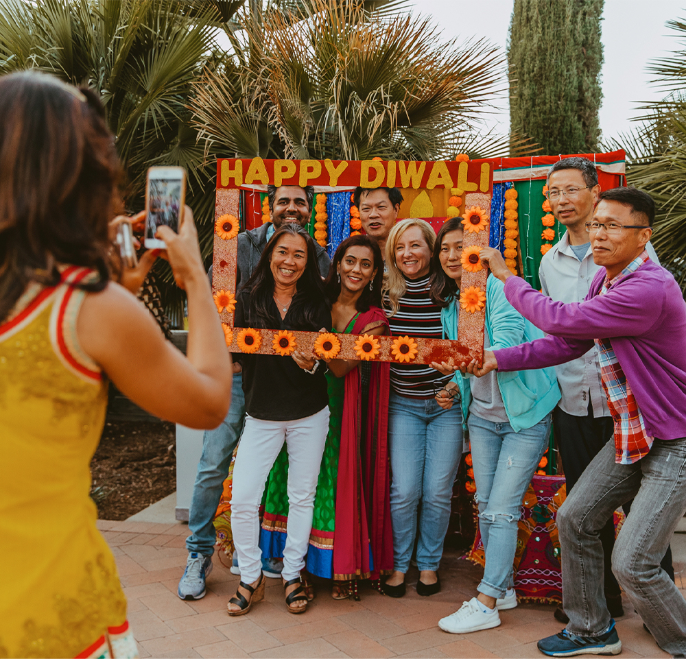 A group of people celebrating Diwali taking a picture